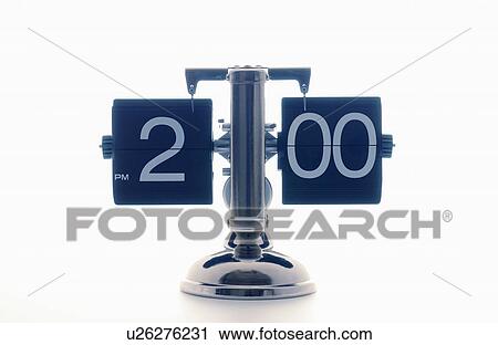 Stock Image - Clock showing 2 o'clock, white background. Fotosearch