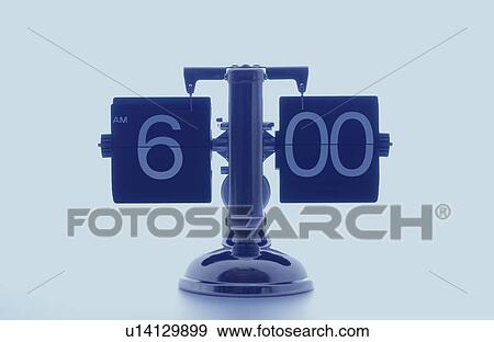 Stock Photo - Clock showing 6 o'clock, white background. Fotosearch