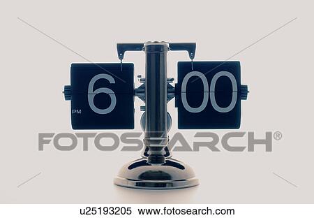 Stock Photography - Clock showing 6 o'clock, white background. Fotosearch