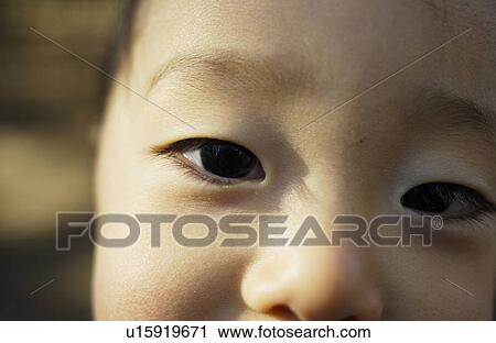 Stock Image - Close-up of baby boy. Fotosearch