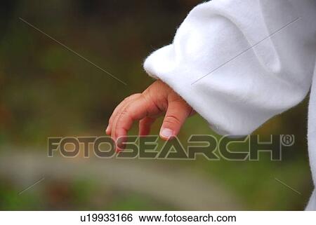 Close up of baby boy's hand, differential focus View Large Photo Image Stock Photograph - Close up of baby boy's hand, differential focus. Fotosearch
