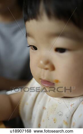 Close-up of baby girl View Large Photo Image Stock Photo - Close-up of baby girl. Fotosearch