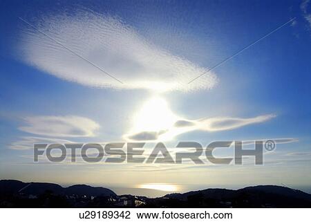 Clouds in sky and silhouette of mountain ranges, Kamakura city, Kanagawa prefecture, Japan View Large Photo Image Stock Image - Clouds in sky and silhouette of mountain ranges, Kamakura city, Kanagawa prefecture, Japan. Fotosearch