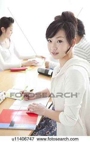 Stock Photo - College students studying. Fotosearch