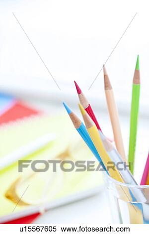 Stock Photography - Colored pencils on desk in office, close up, differential focus. Fotosearch