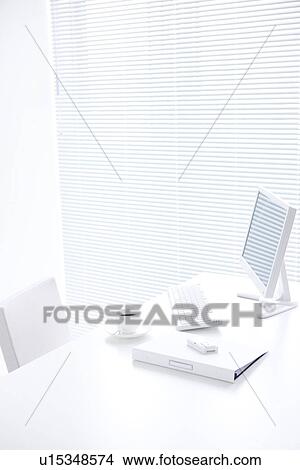 Picture - Computer and coffee cup on desk. Fotosearch