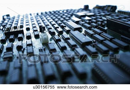 Stock Photography - Computer circuit board, close up, white background. Fotosearch
