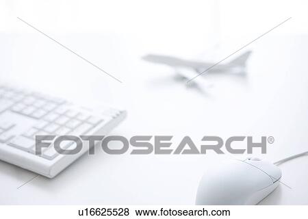 Computer keyboard, computer mouse and toy airplane on white background View Large Photo Image Stock Photo - Computer keyboard, computer mouse and toy airplane on white background. Fotosearch