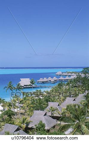 Cottages By Blue Sea View Large Photo Image Picture - Cottages By Blue Sea. Fotosearch
