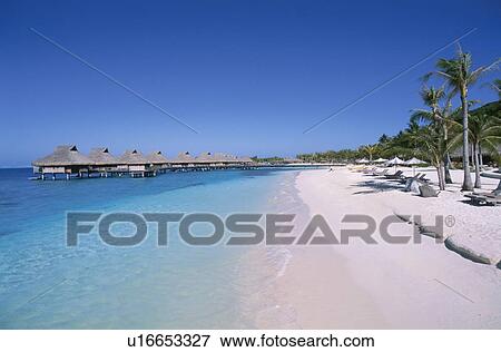 Stock Photo - Cottages By Blue Sea. Fotosearch