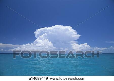 Stock Photo - Cumulonimbus Cloud Over the Sea Horizon. Fotosearch