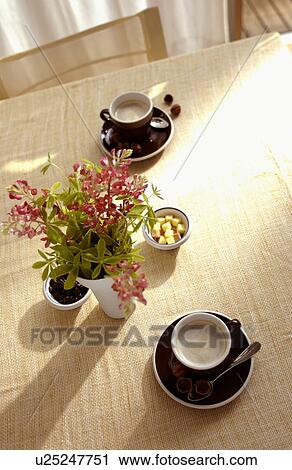 Cup of Coffees on dining table View Large Photo Image Stock Image - Cup of Coffees on dining table. Fotosearch