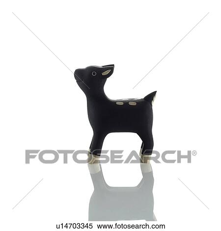 Stock Photography - Deer figurine on white background. Fotosearch