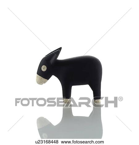 Stock Photo - Donkey figurine on white background. Fotosearch