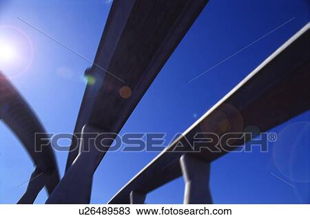 Stock Image - Elevated road against sky, blue background, Tokyo prefecture, Japan. Fotosearch