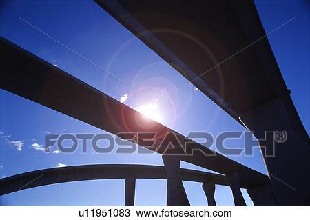 Stock Image - Elevated road against sky, Tokyo prefecture, Japan. Fotosearch