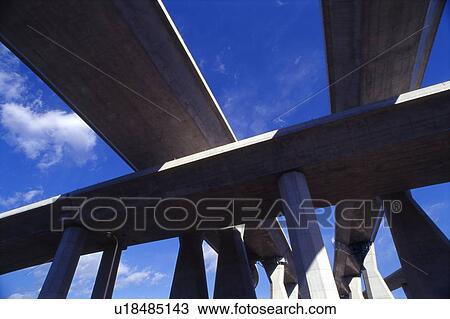 Stock Image - Elevated road against sky, Tokyo prefecture, Japan. Fotosearch