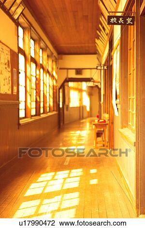Stock Image - Empty corridor in school, sepia toned, Hino town, Shiga prefecture, Japan. Fotosearch