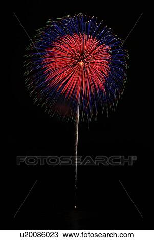 Stock Image - Fireworks exploding in sky, black background, long exposure, Zushi city, Kanagawa prefecture, Japan. Fotosearch