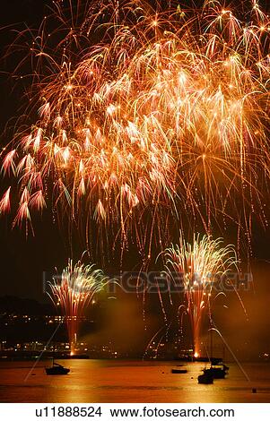 Fireworks exploding in sky, long exposure, Zushi city, Kanagawa prefecture, Japan View Large Photo Image Picture - Fireworks exploding in sky, long exposure, Zushi city, Kanagawa prefecture, Japan. Fotosearch