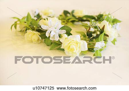 Stock Photography - Flower wreath, white background. Fotosearch