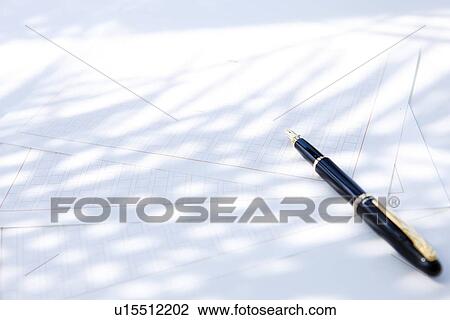 Stock Image - Fountain pen on papers, close up, white background. Fotosearch