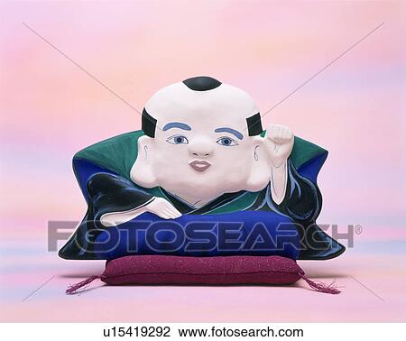 Fukusuke sitting on cushion View Large Photo Image Stock Image - Fukusuke sitting on cushion. Fotosearch
