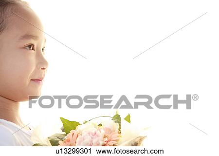 Girl holding a bouquet View Large Photo Image Stock Image - Girl holding a bouquet. Fotosearch