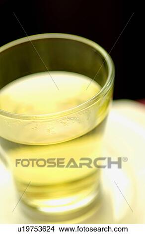 Picture - Glass of herbal tea, close up. Fotosearch