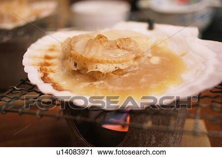 Stock Image - Grilled scallop. Fotosearch