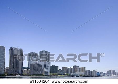 High rise buildings under sky, copy space, Tokyo prefecture, Japan View Large Photo Image Picture - High rise buildings under sky, copy space, Tokyo prefecture, Japan. Fotosearch