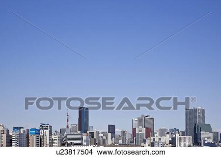 High rise buildings under sky, copy space, Tokyo prefecture, Japan View Large Photo Image Picture - High rise buildings under sky, copy space, Tokyo prefecture, Japan. Fotosearch