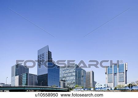 Stock Image - High rise buildings under sky, copy space, Tokyo prefecture, Japan. Fotosearch