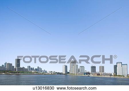 Stock Image - High rise buildings under sky, copy space, Tokyo prefecture, Japan. Fotosearch
