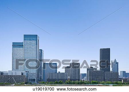 High rise buildings under sky, copy space, Tokyo prefecture, Japan View Large Photo Image Stock Image - High rise buildings under sky, copy space, Tokyo prefecture, Japan. Fotosearch