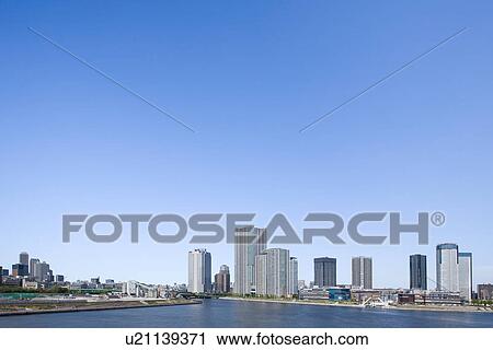 High rise buildings under sky, copy space, Tokyo prefecture, Japan View Large Photo Image Stock Image - High rise buildings under sky, copy space, Tokyo prefecture, Japan. Fotosearch