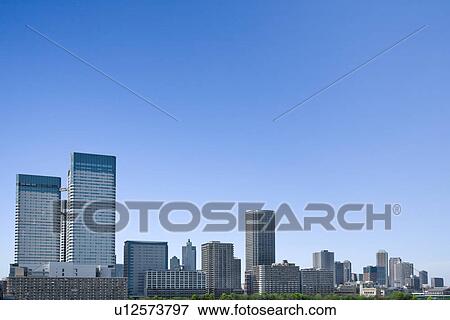 High rise buildings under sky, copy space, Tokyo prefecture, Japan View Large Photo Image Stock Photo - High rise buildings under sky, copy space, Tokyo prefecture, Japan. Fotosearch