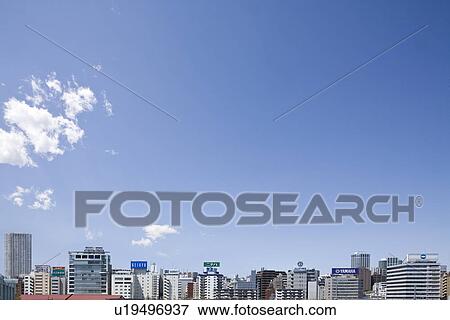 High rise buildings under sky, copy space, Tokyo prefecture, Japan View Large Photo Image Stock Photo - High rise buildings under sky, copy space, Tokyo prefecture, Japan. Fotosearch