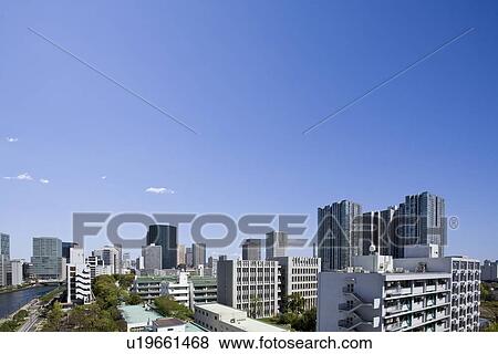 High rise buildings under sky, copy space, Tokyo prefecture, Japan View Large Photo Image Stock Photo - High rise buildings under sky, copy space, Tokyo prefecture, Japan. Fotosearch
