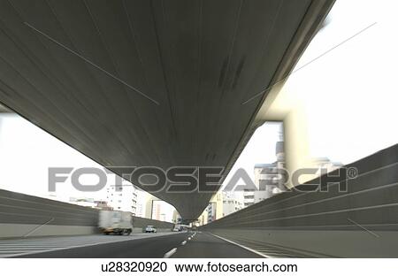 Stock Image - Highway, blurred motion, Tokyo prefecture, Kanagawa prefecture, Japan. Fotosearch