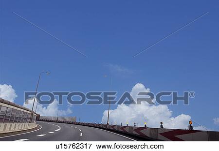 Stock Photo - Highway under sunny sky, copy space, Tokyo prefecture, Kanagawa prefecture, Japan. Fotosearch