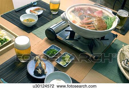 Stock Image - Hot pot dish with crab and red sea bream. Fotosearch