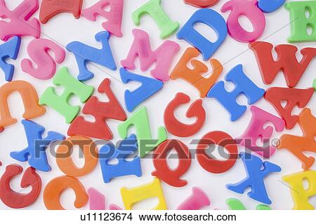Letter magnets, close up, white background, full frame View Large Photo Image Picture - Letter magnets, close up, white background, full frame. Fotosearch