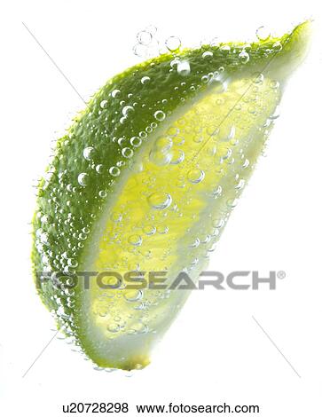 Lime in Carbonated Water View Large Photo Image Stock Photo - Lime in Carbonated Water. Fotosearch