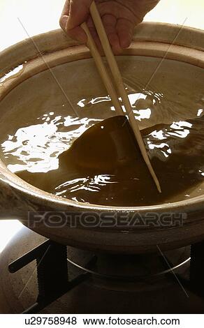 Stock Photo - Making broth from Kombu seaweed. Fotosearch