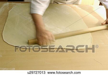 Man making Soba noodles, rolling dough, blurred motion View Large Photo Image Stock Image - Man making Soba noodles, rolling dough, blurred motion. Fotosearch