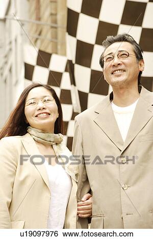 Mature couple smiling View Large Photo Image Stock Photograph - Mature couple smiling. Fotosearch