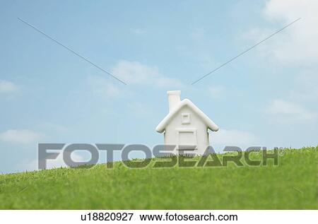 Stock Photo - Miniature house on grass, Gunma Prefecture, Honshu, Japan. Fotosearch