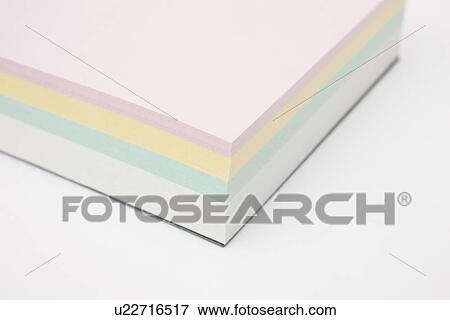 Stock Photo - Note pad on white background, close up. Fotosearch