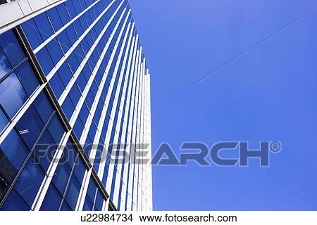 Office building under sky, copy space, Nishinomiya city, Hyogo prefecture, Japan View Large Photo Image Picture - Office building under sky, copy space, Nishinomiya city, Hyogo prefecture, Japan. Fotosearch